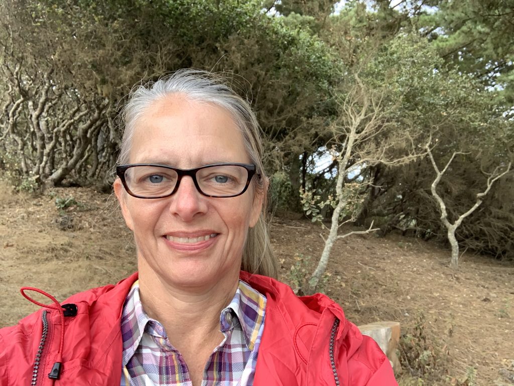 Kim Alderson in a wind-sculpted oak grove on Plaskett Ridge.