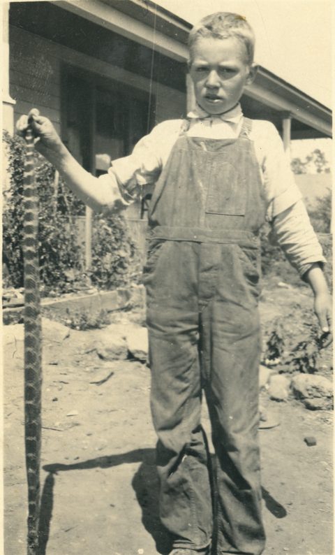 Cyril Plaskett holding a rattlesnake.