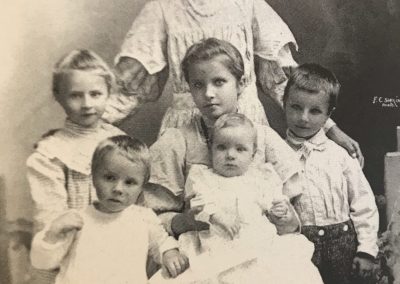 Kate Dani raised 6 children of her own and 3 of her sisters Albert on right
