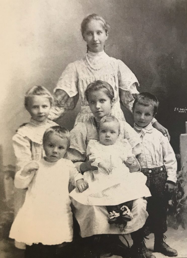 Kate Dani raised 6 children of her own and 3 of her sisters Albert on right